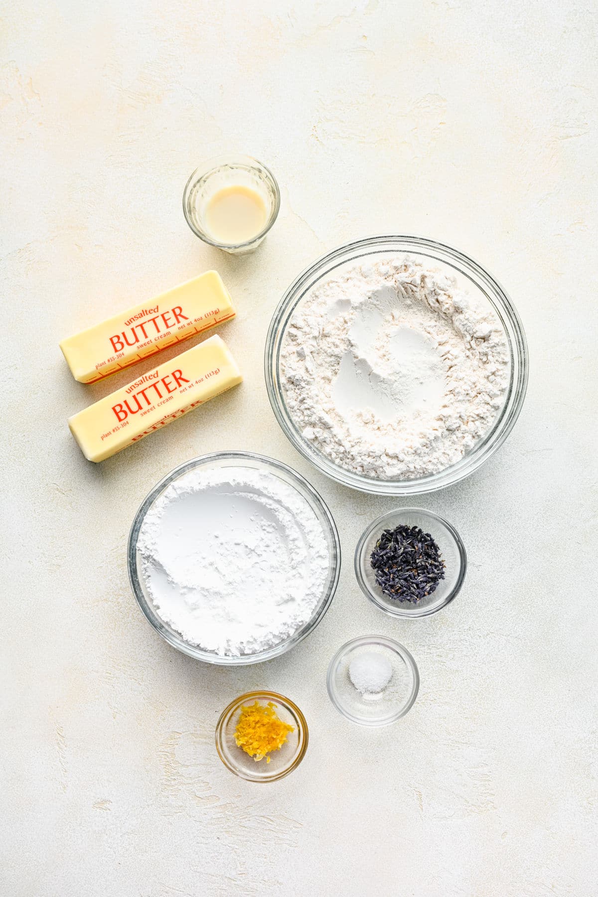 Ingredients for lavender cookies in dishes. 