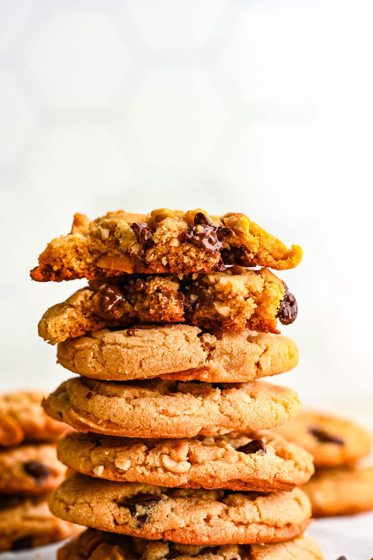 A stack of peanut butter chocolate chip cookies. 