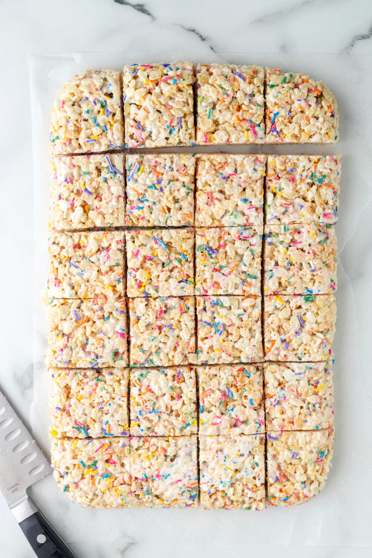 Rice krispies treats cut into squares.