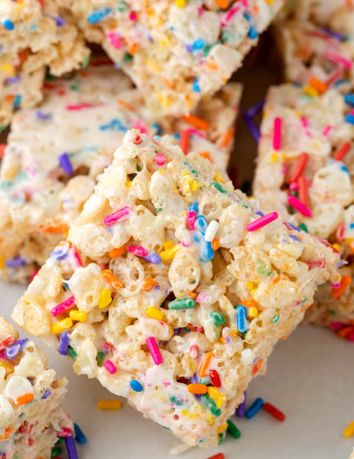 A funfetti rice krispie treat on an angle.