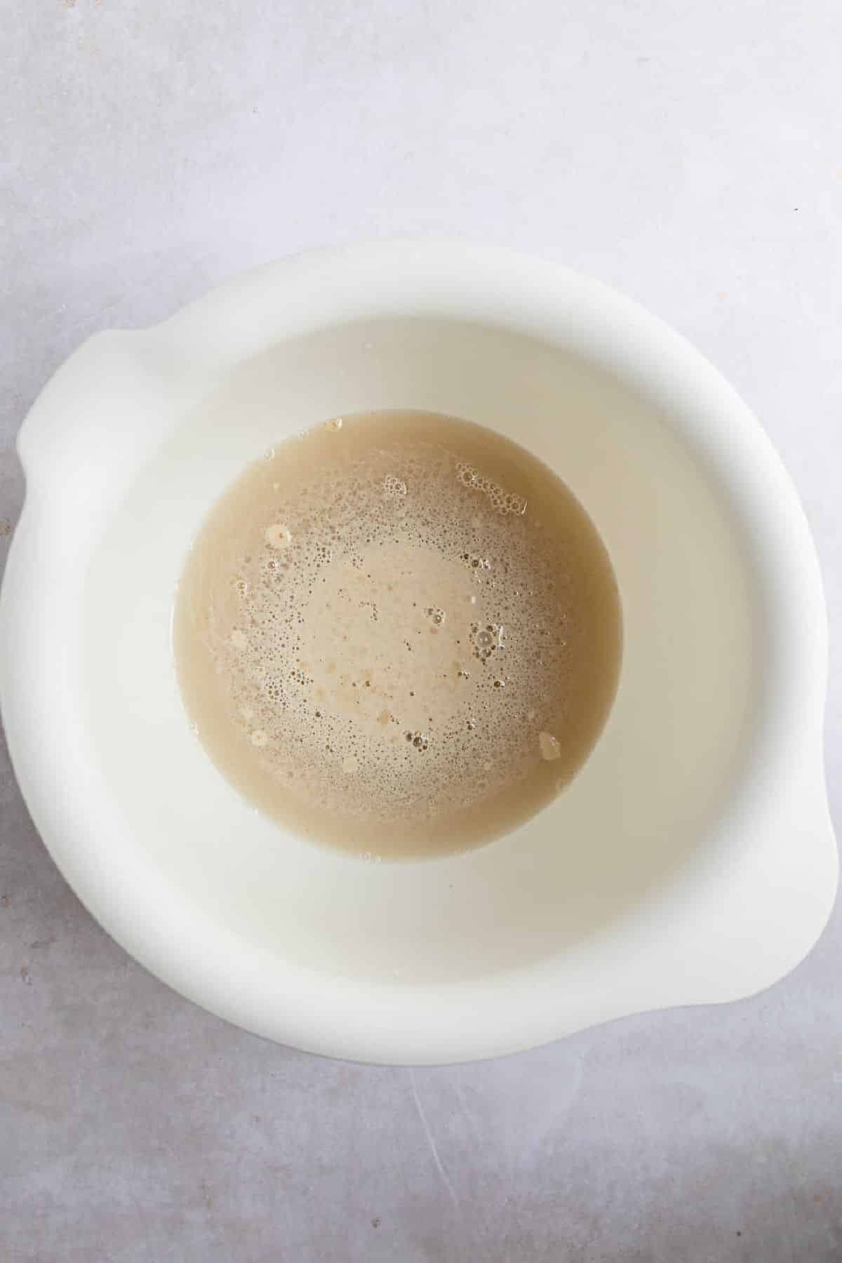 Proofed yeast in a mixing bowl. 