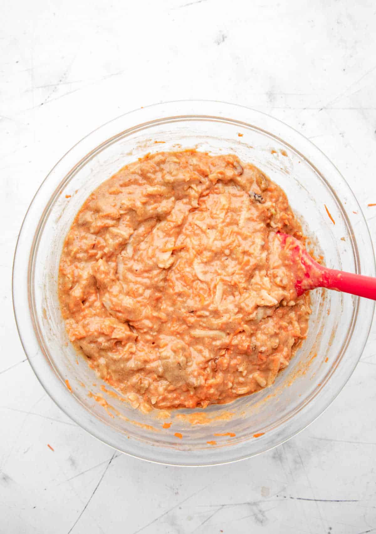 Fruit and veggies stirred into morning glory muffin batter. 