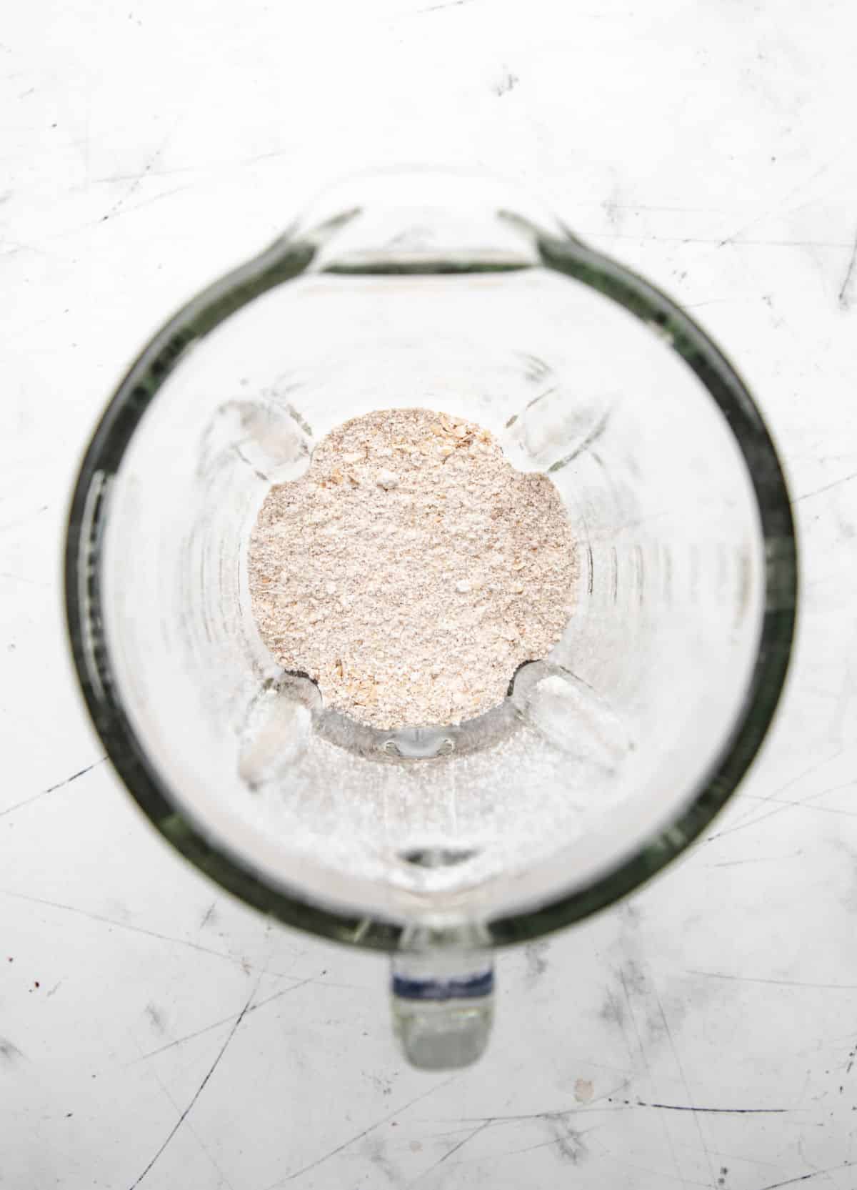 Oats processed into flour in a blender.