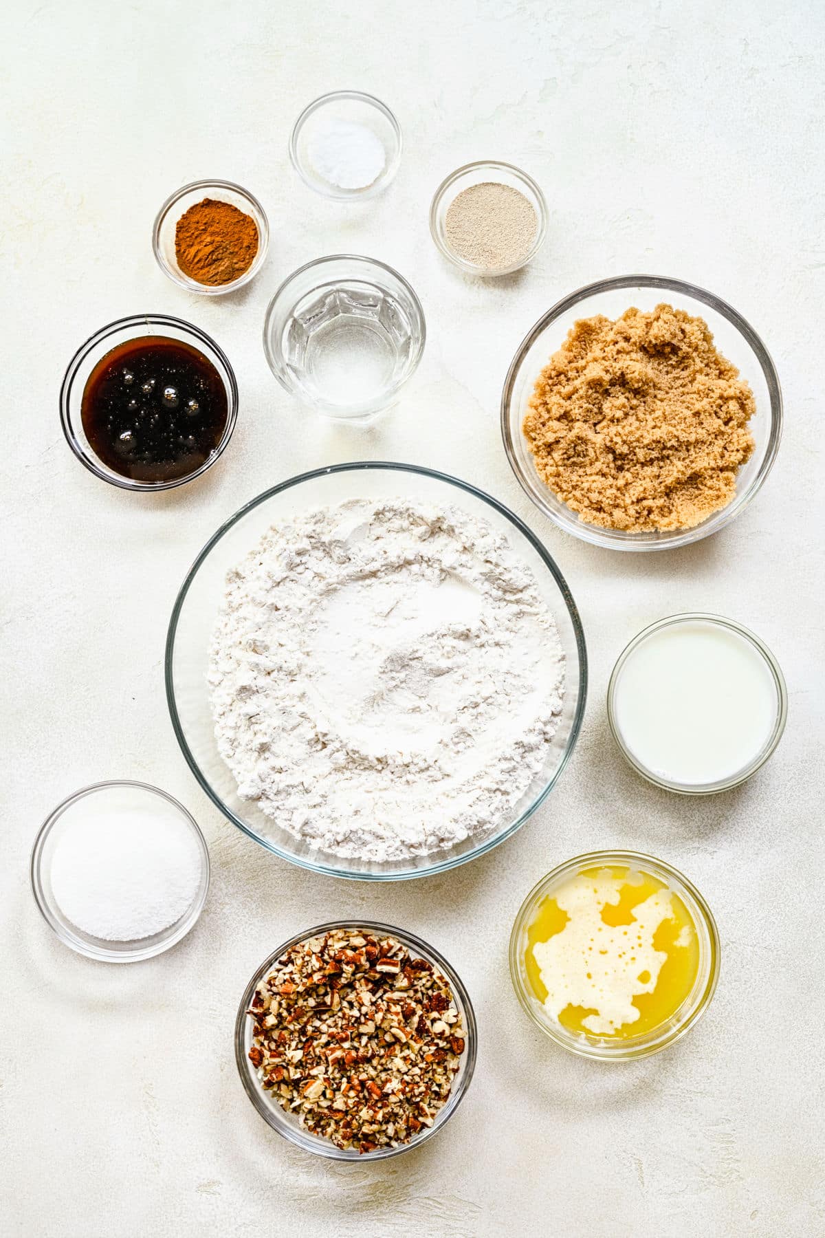 Ingredients for homemade sticky bun recipe in dishes. 