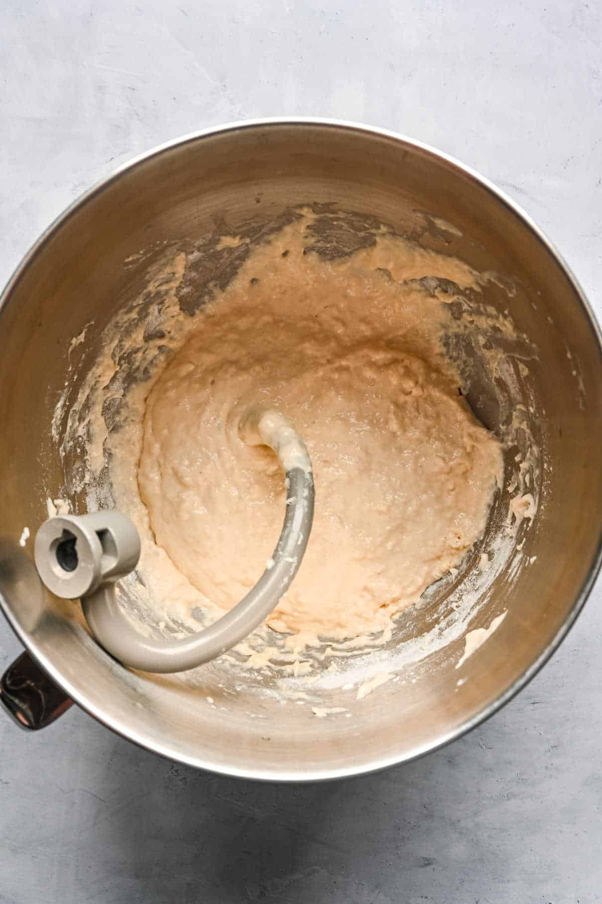 Part of the flour mixed into yeast mixture for white bread. 