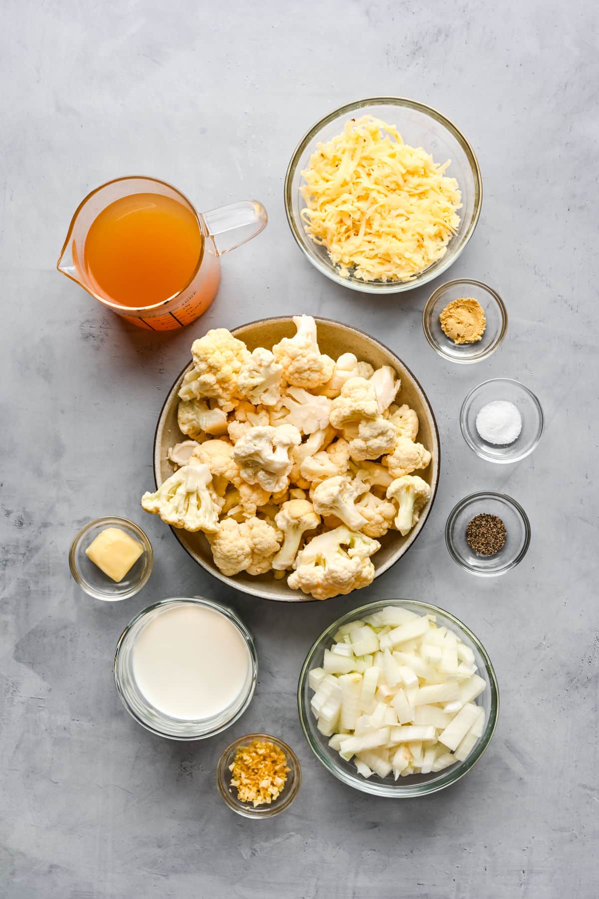 Ingredients for Wisconsin cauliflower soup in dishes. 