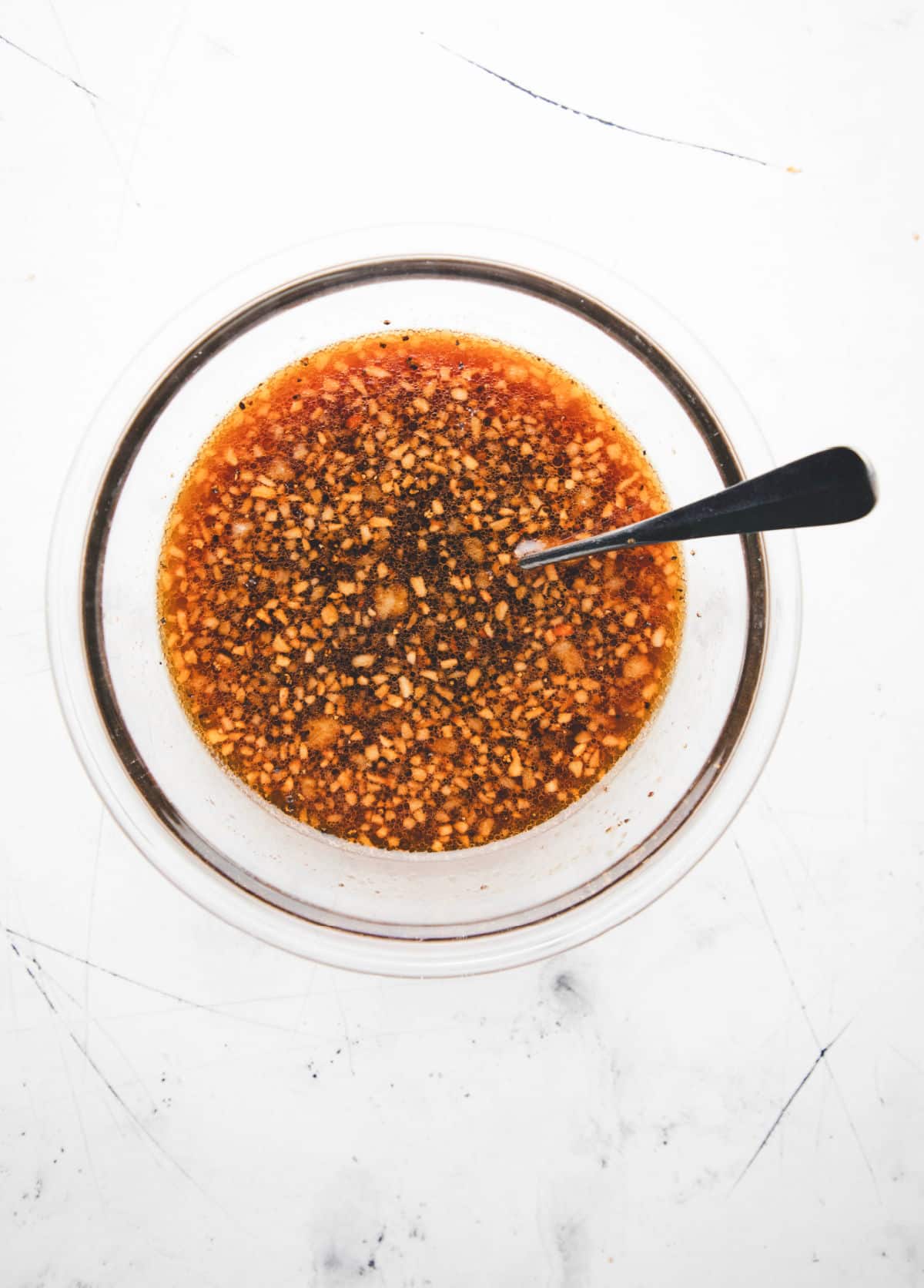 Sauce for slow cooker Korean beef in a glass mixing bowl. 