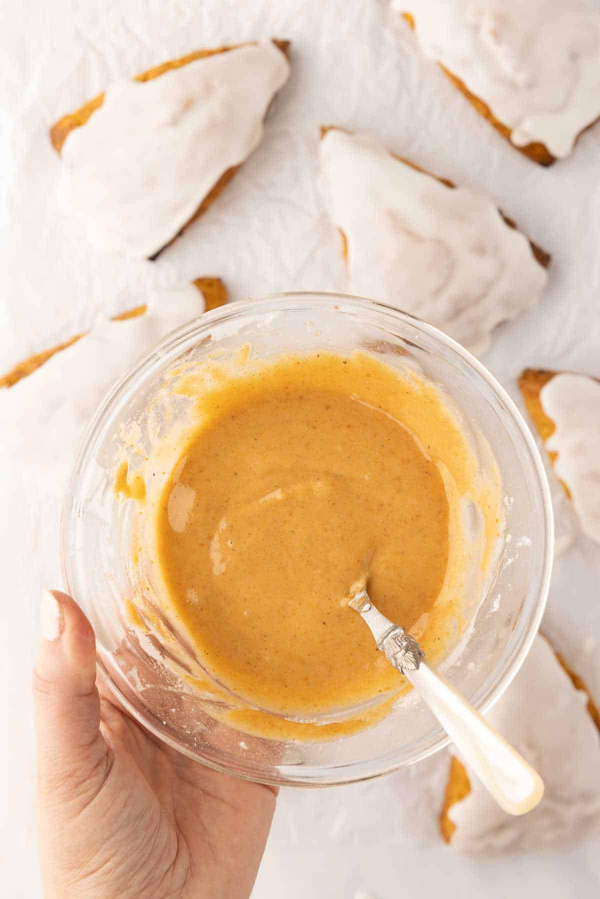 Pumpkin glaze in a glass mixing bowl. 