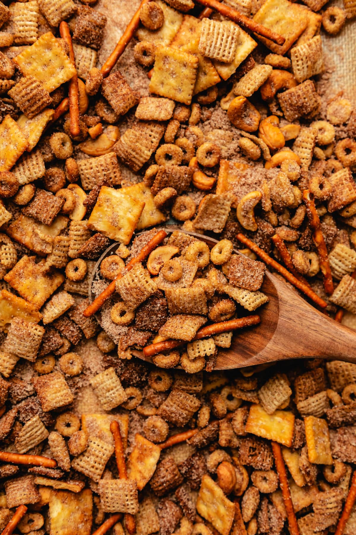 A baking sheet full of cinnamon sweet and salty Chex mix.
