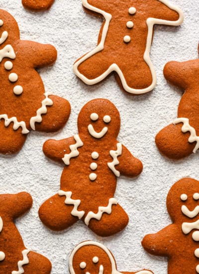 No chill gingerbread men on a powdered sugar surface.