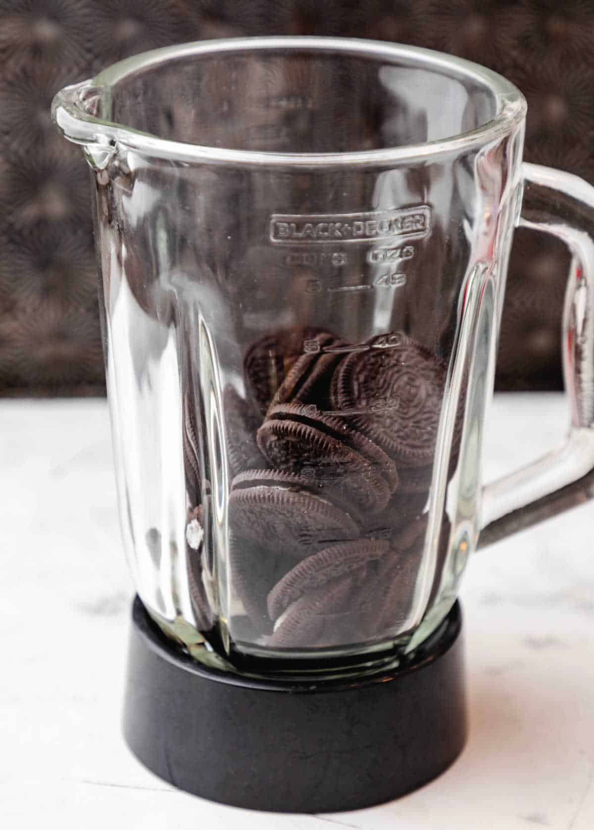 Oreo cookies in a blender base. 