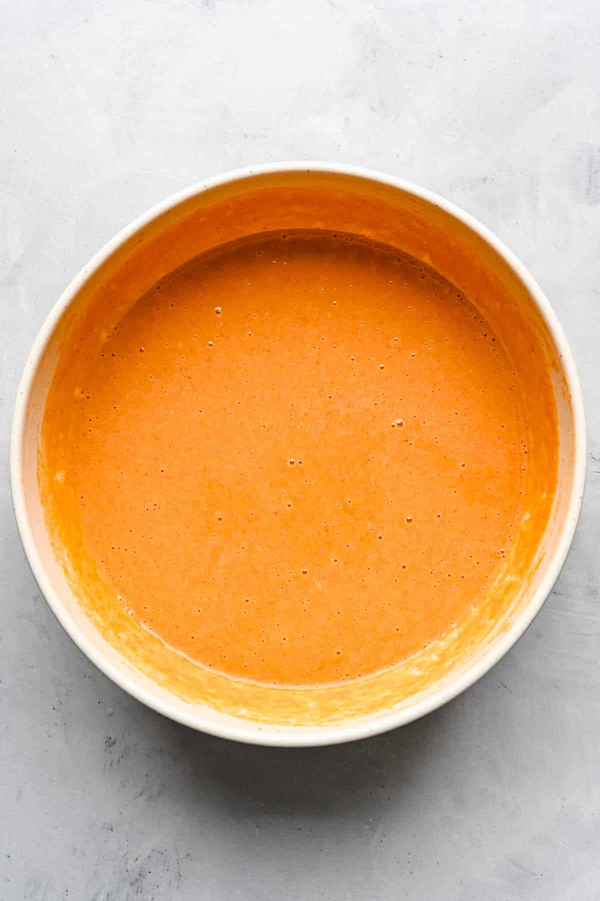 Evaporated milk whisked into pumpkin mixture.