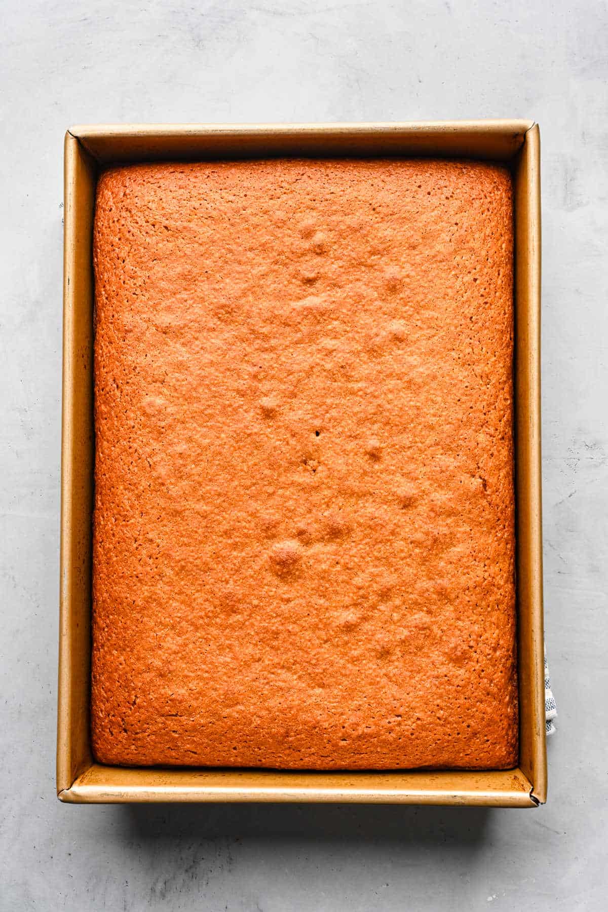 Baked spice cake in a cake pan.