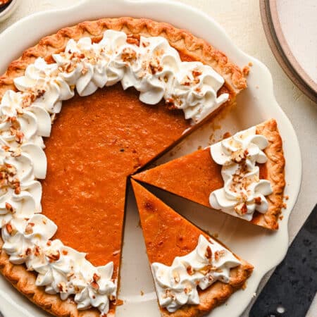 Sweet Potato pie with two pieces cut in the pan.