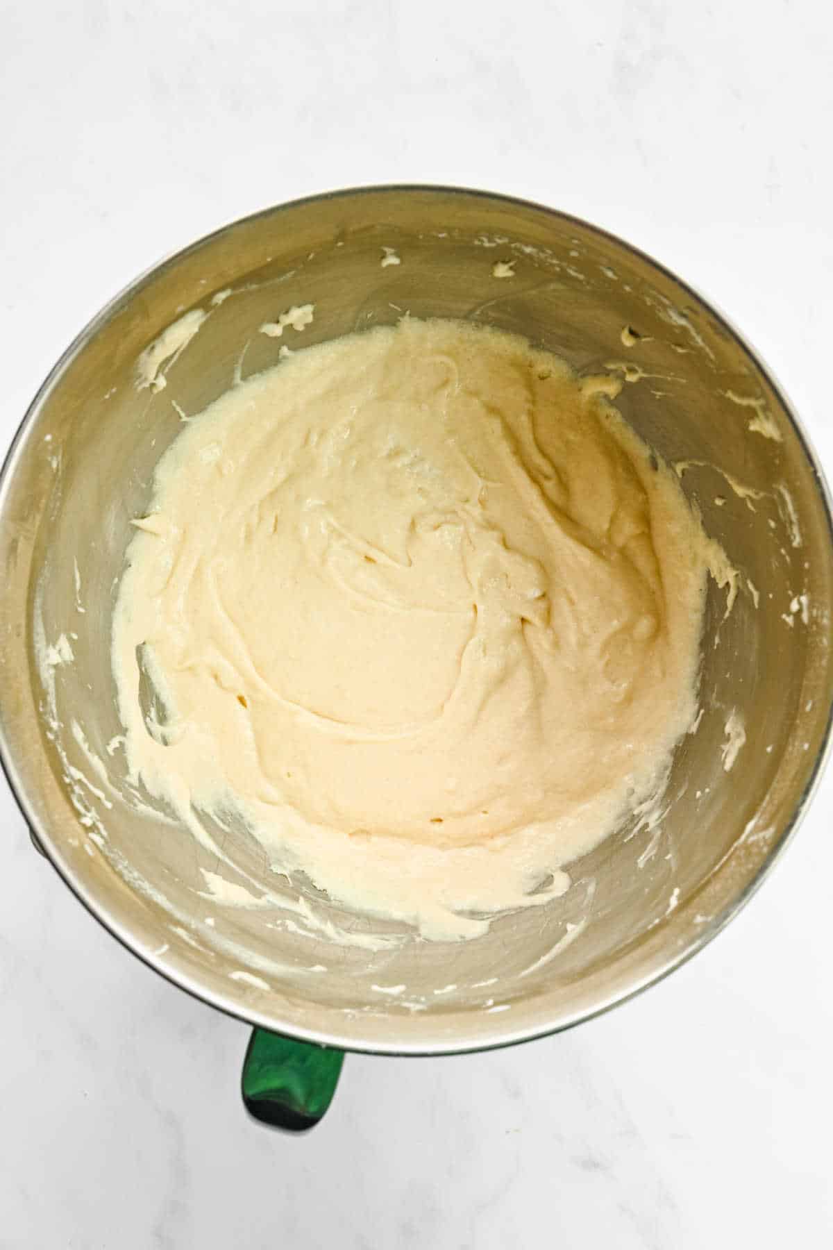 White chocolate beaten into creamed butter mixture. 
