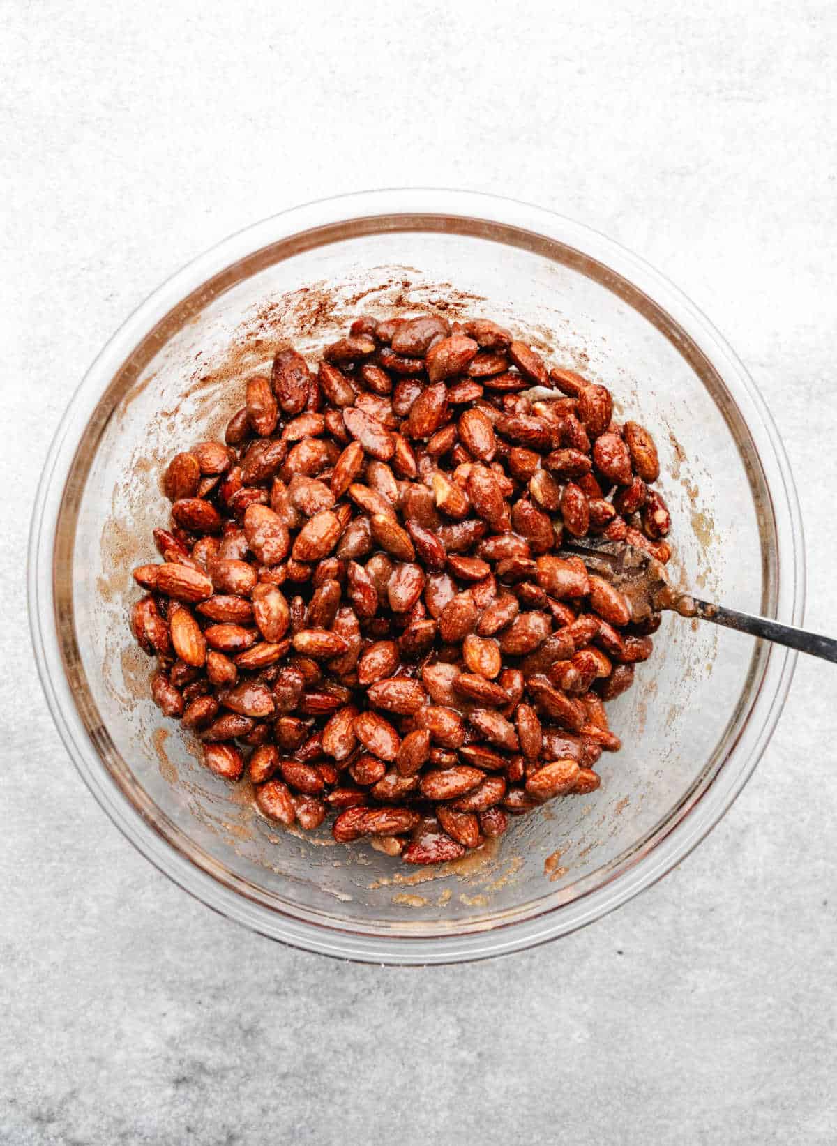 Almonds coated in cinnamon sugar egg mixture. 