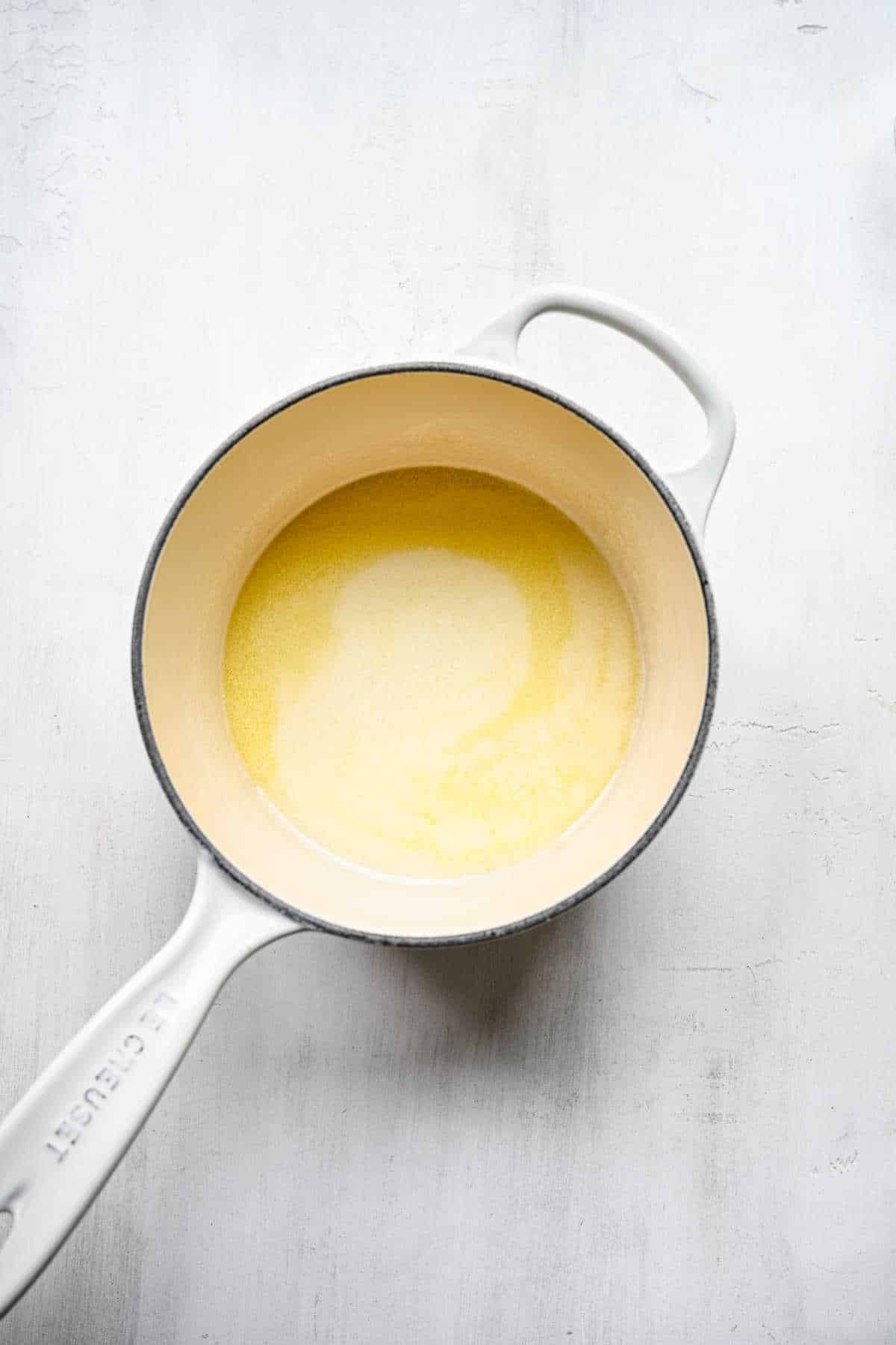 Melted butter in a saucepan.