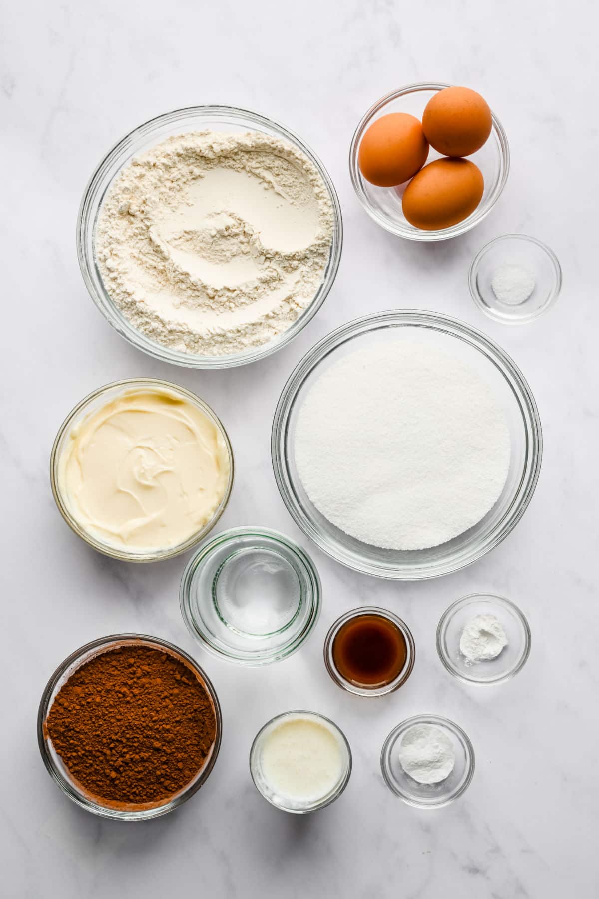 Ingredients for chocolate mayonnaise cake in dishes. 