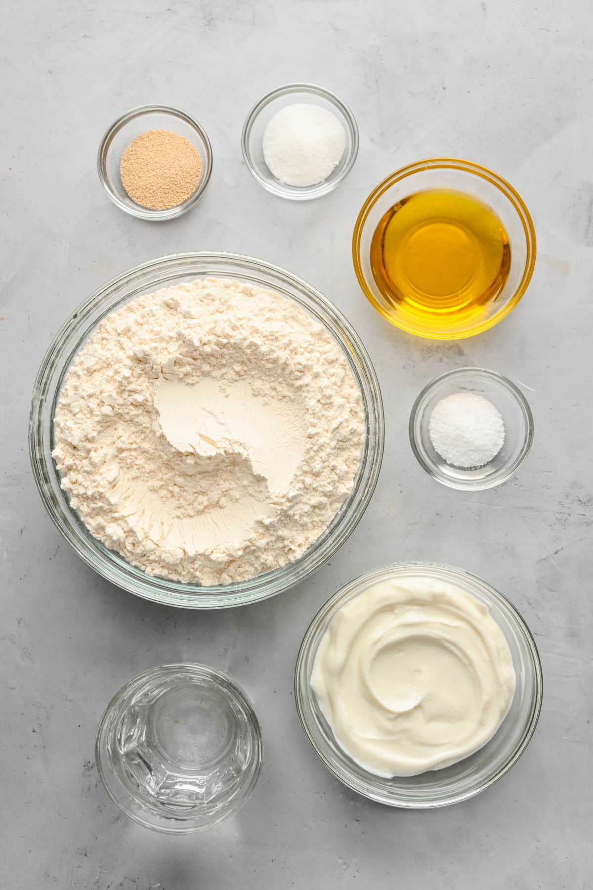 Ingredients for homemade flatbreads in dishes. 