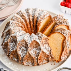 Three slices of Greek yogurt pound cake cut from the rest of the cake.