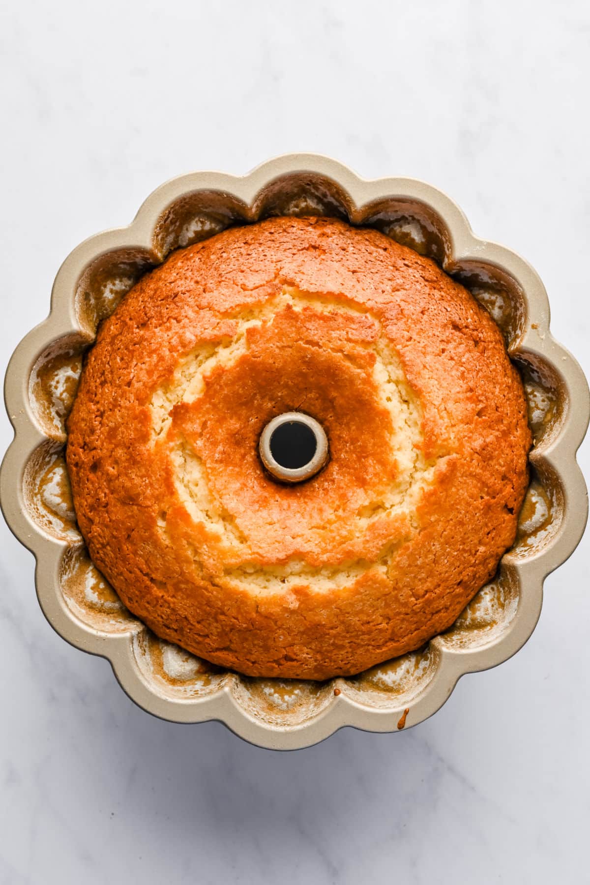 Baked Greek yogurt pound cake in a bundt pan.