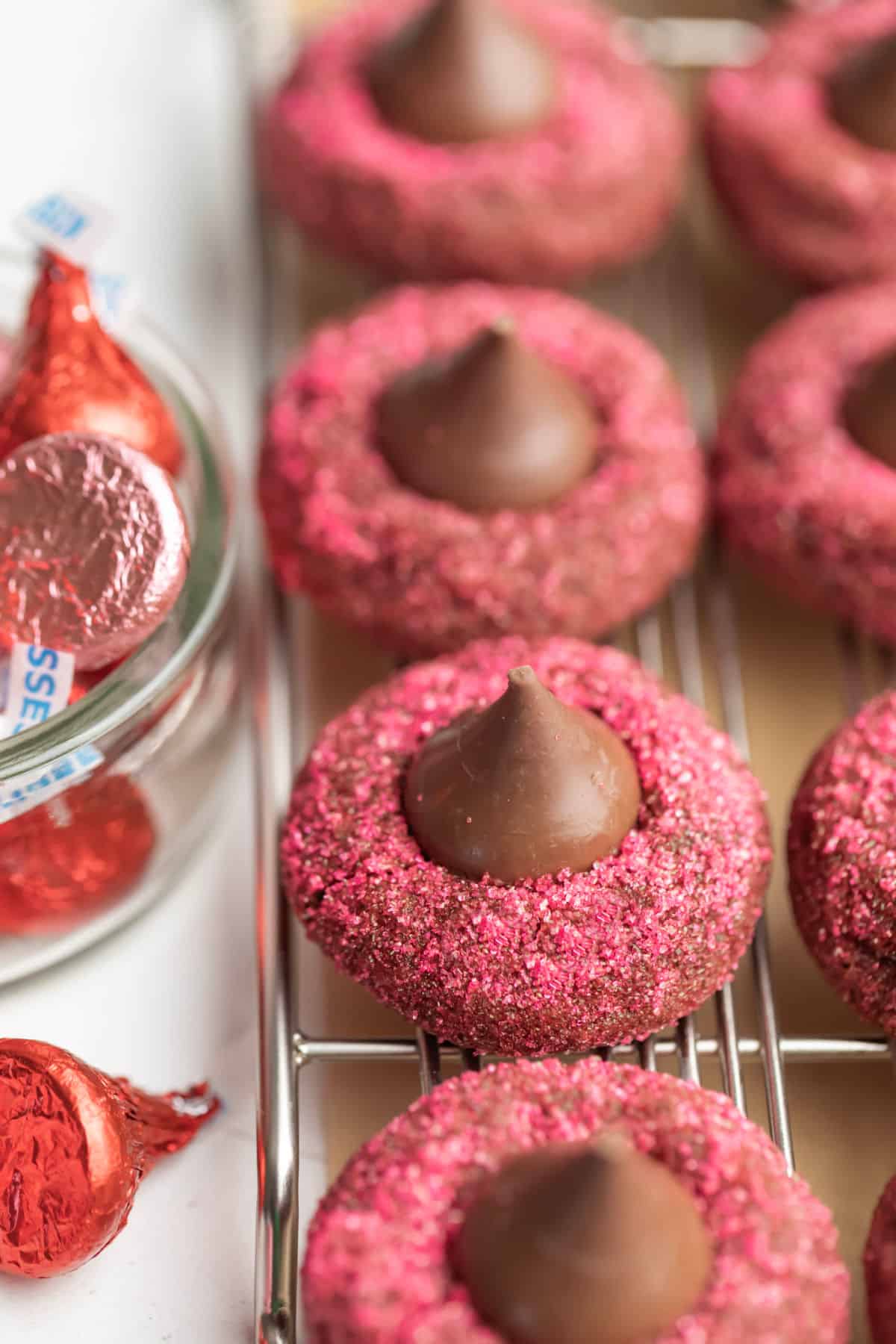 Valentine's Day kiss cookies coated in pink sanding sugar.