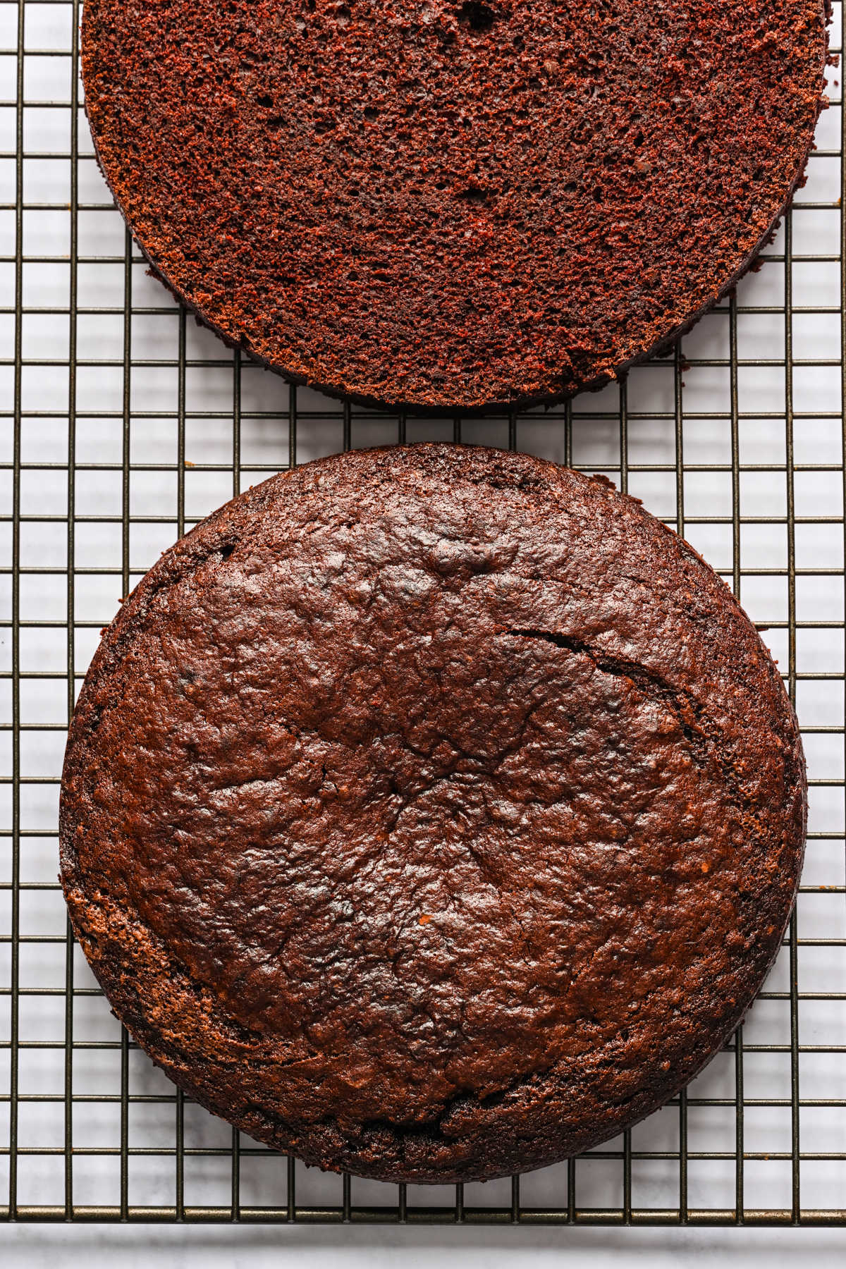 Baked brownie cake sliced in half horizontally.