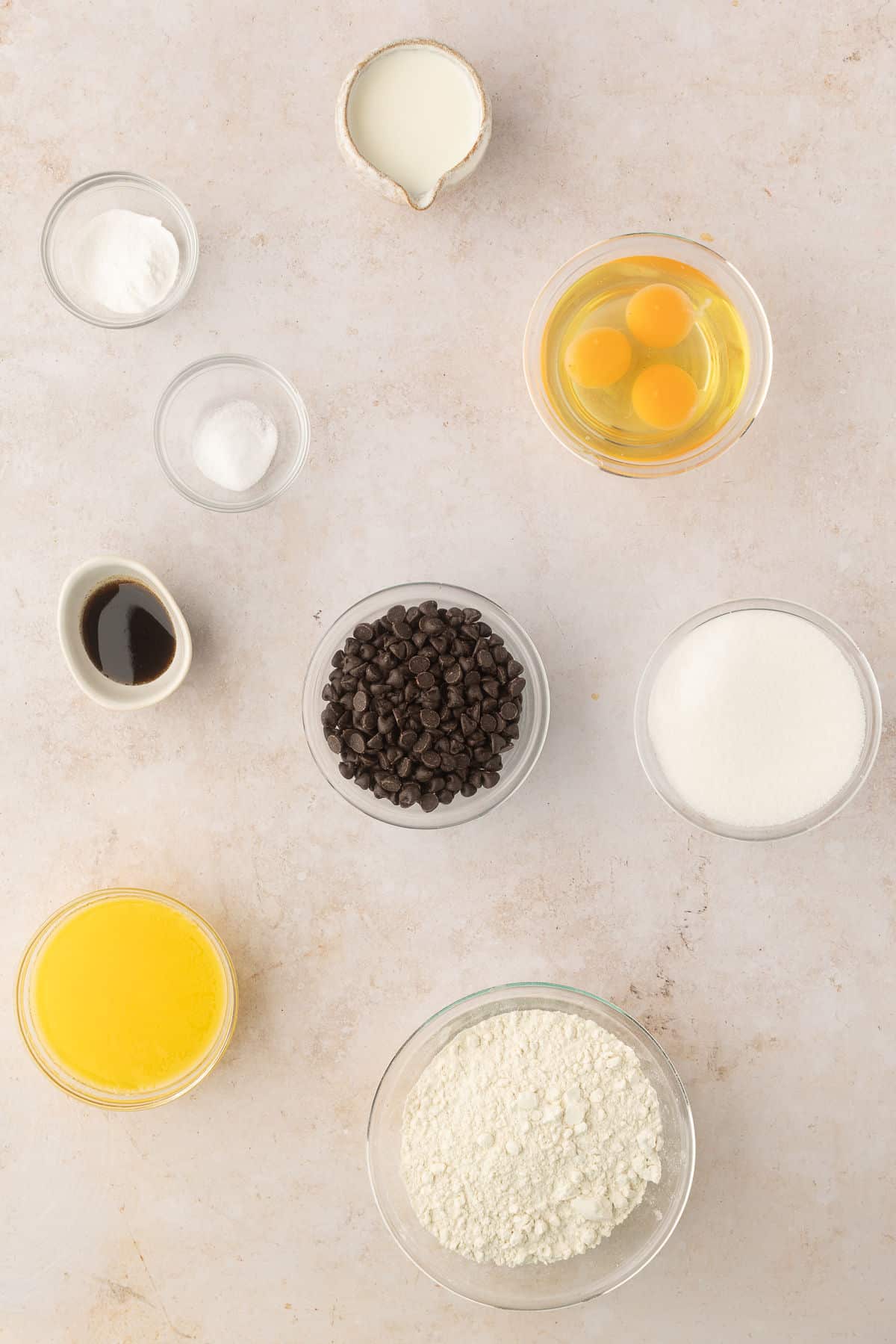 Ingredients for chocolate chip loaf cake in dishes. 