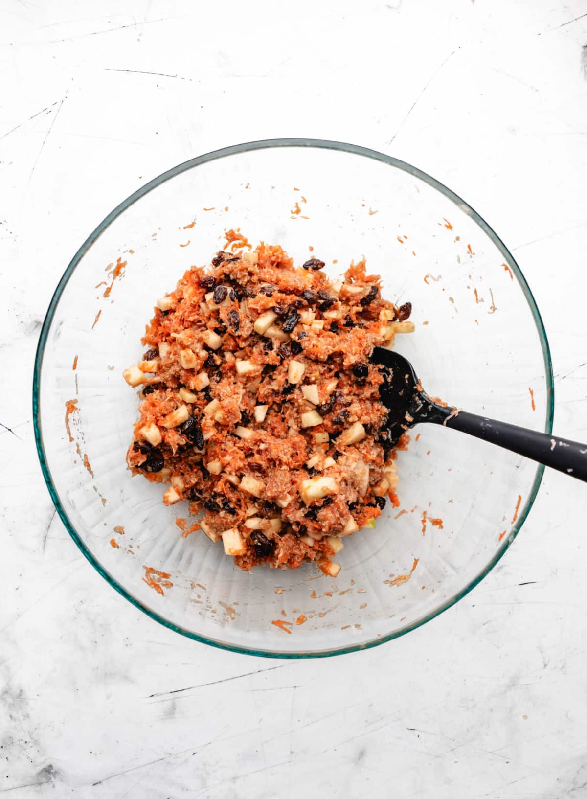 Carrot raisin potato and apple mixed into breadcrumb mixture.