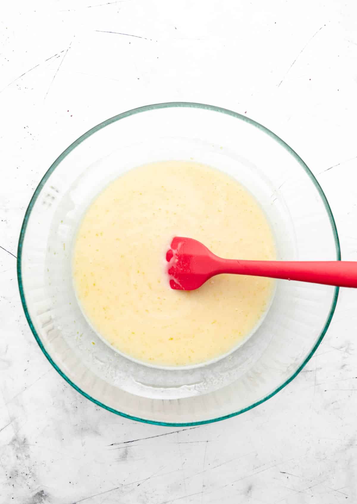 Buttermilk stirred into lemon sugar mixture.