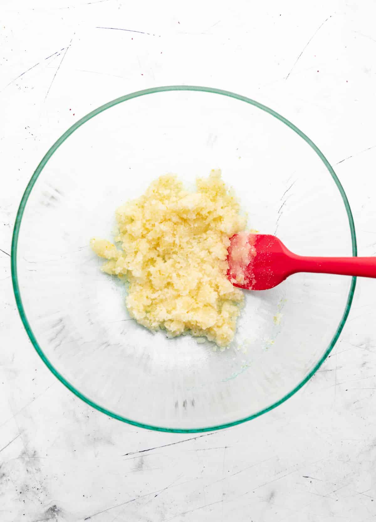 Oil mixed into lemon sugar mixture. 