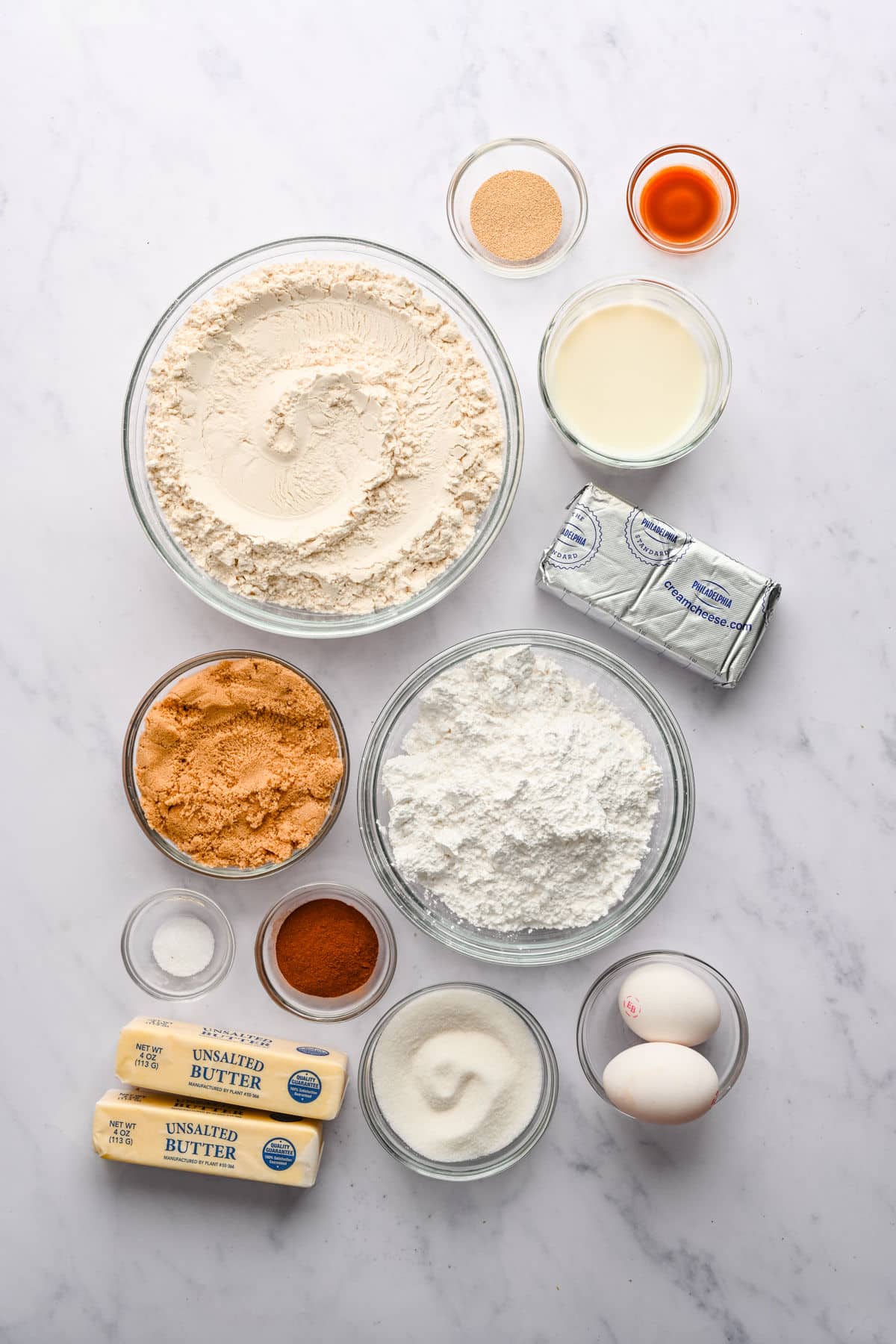 Ingredients for Easter bunny cinnamon rolls in dishes. 