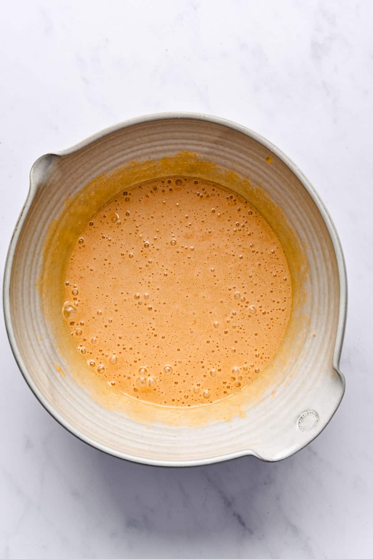 eggs mixed into sugars for hummingbird cake.