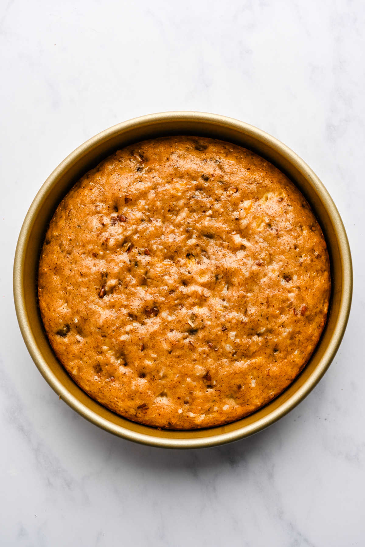 Baked hummingbird cake in pan.