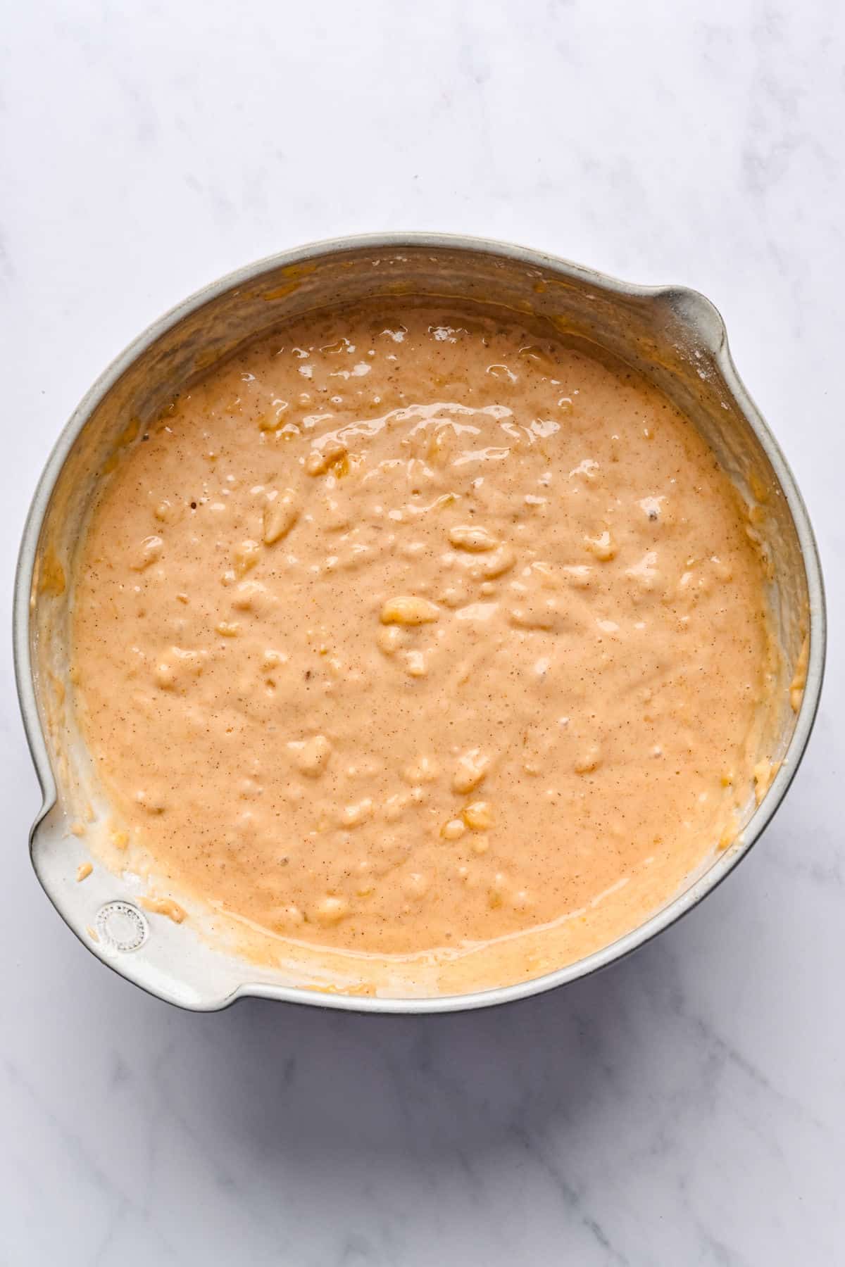 Wet and dry ingredients mixed together for hummingbird cake.