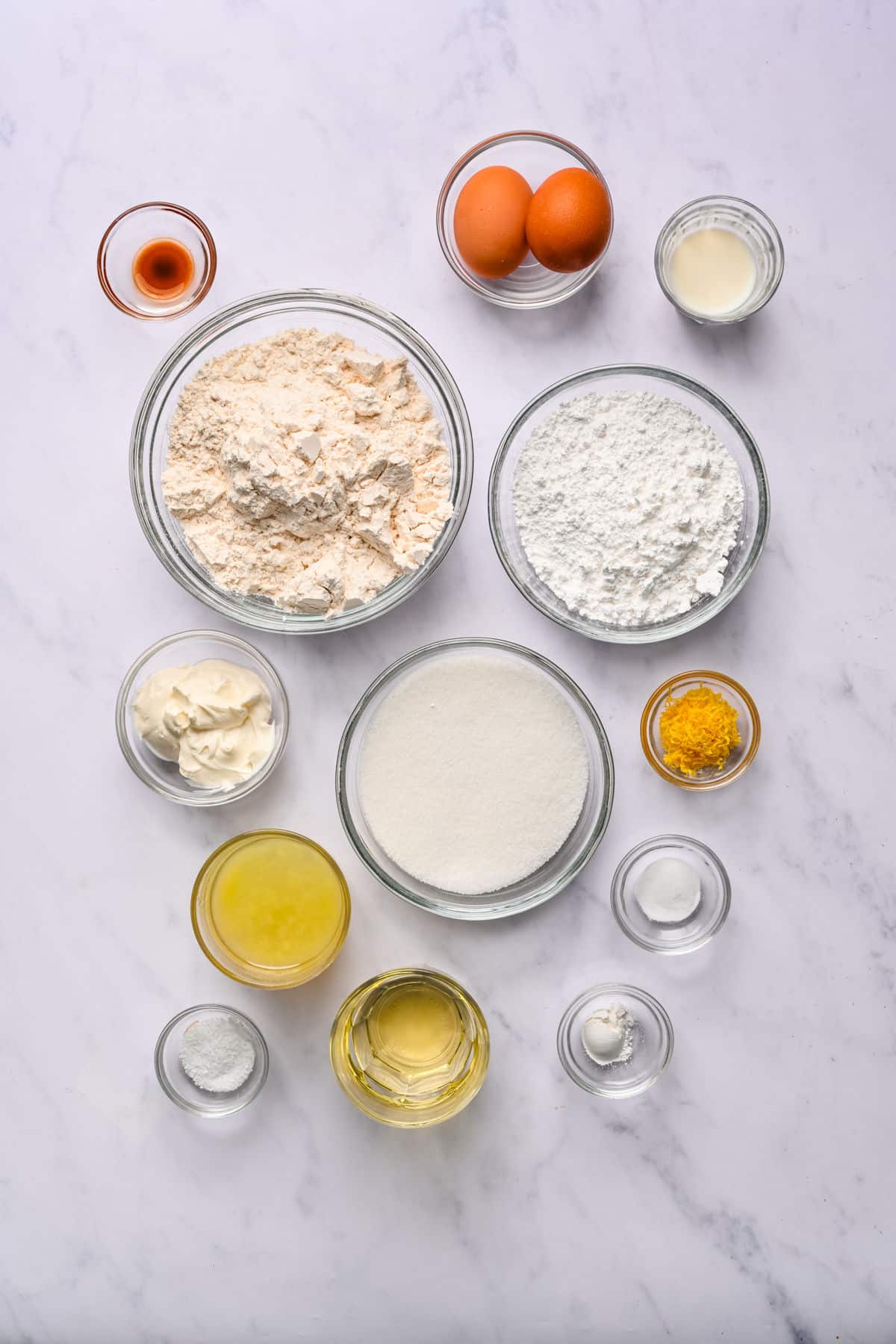 Ingredients for lemon loaf cake in dishes. 