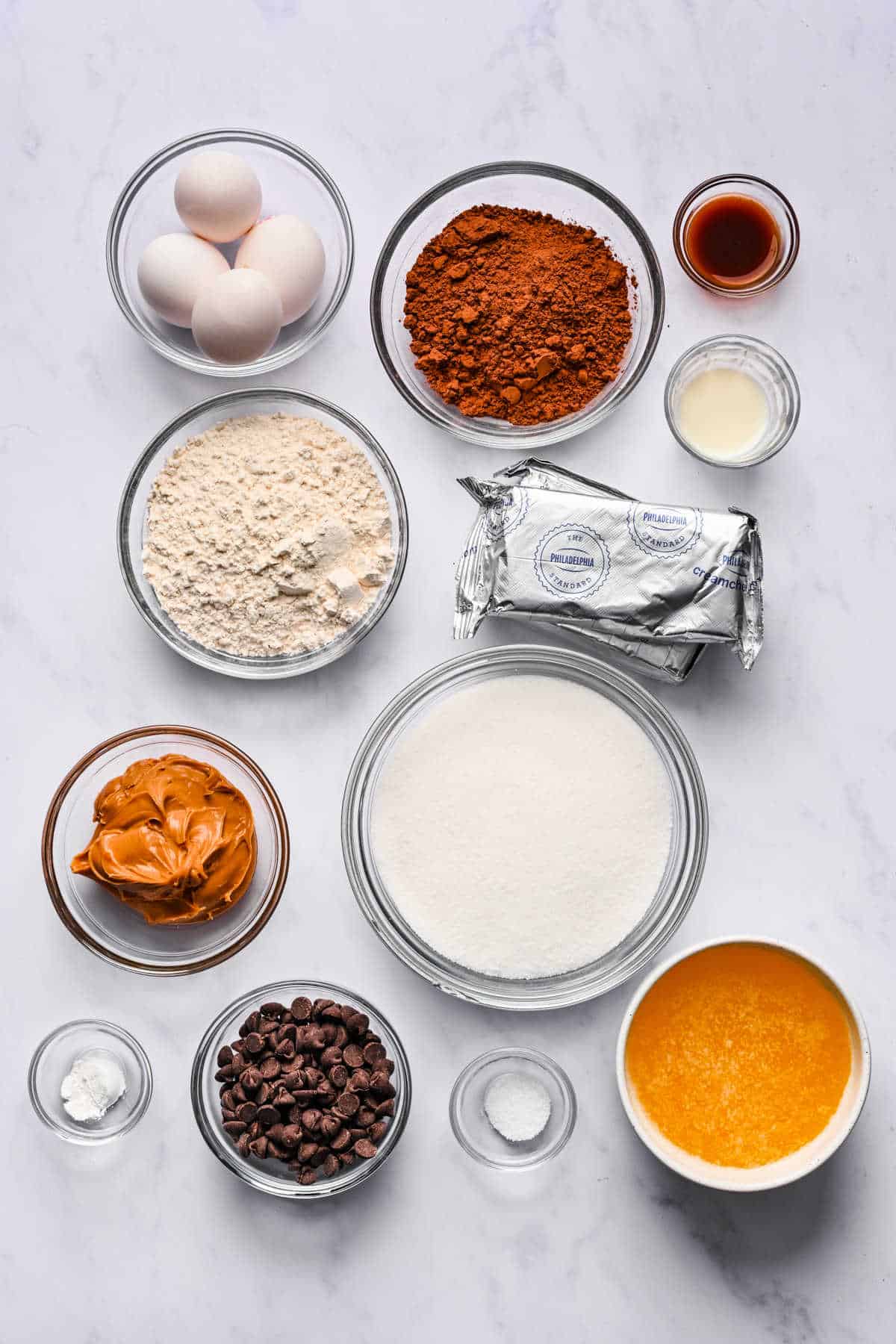 Ingredients for peanut butter brownies in dishes. 