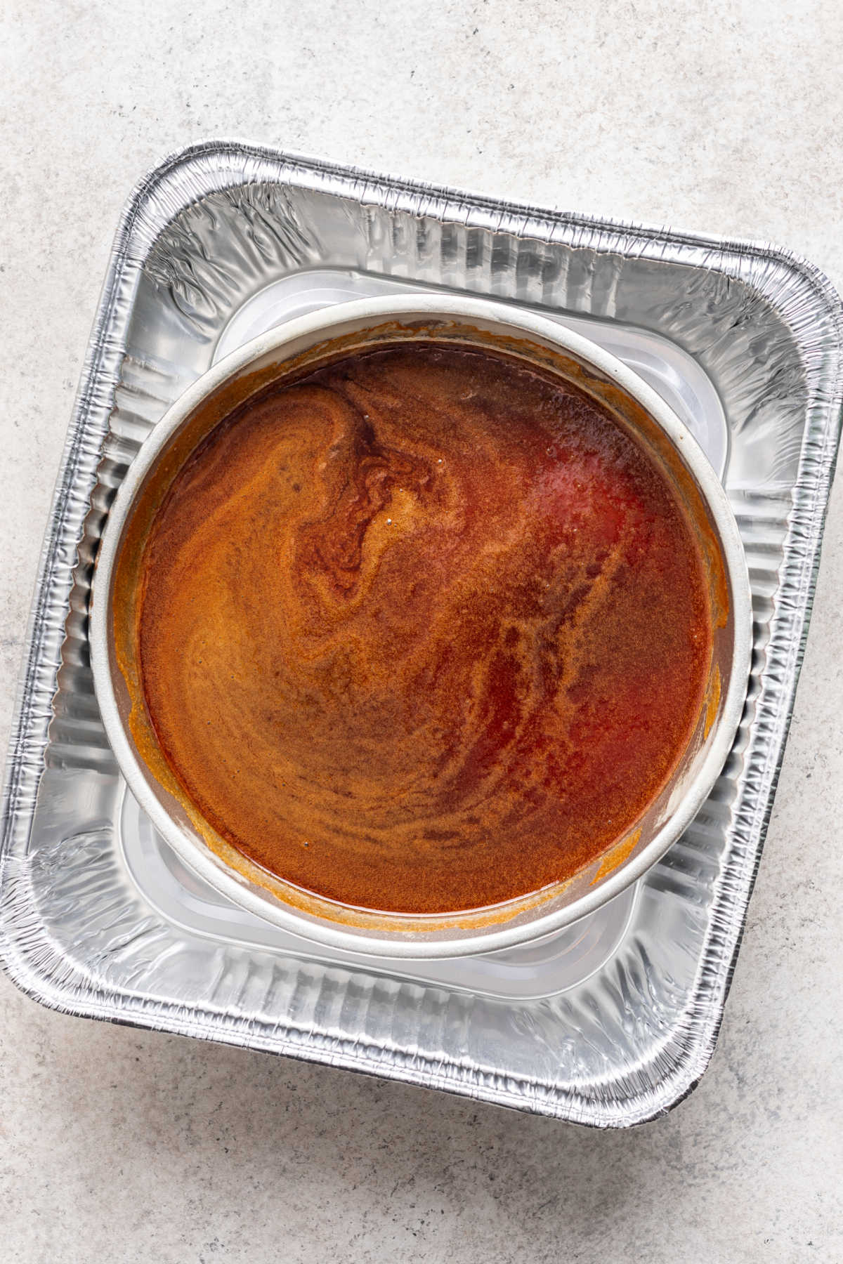 Caramel in a round cake pan.