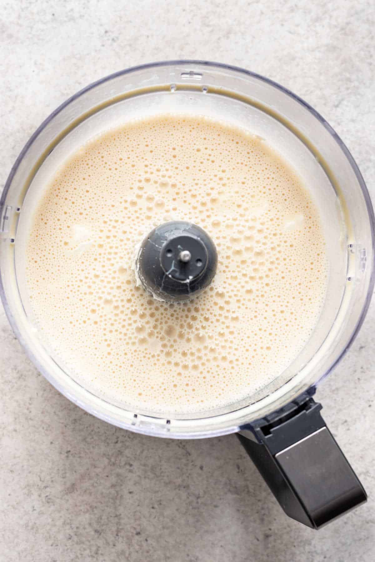 Blended dairy and eggs for flan de queso.