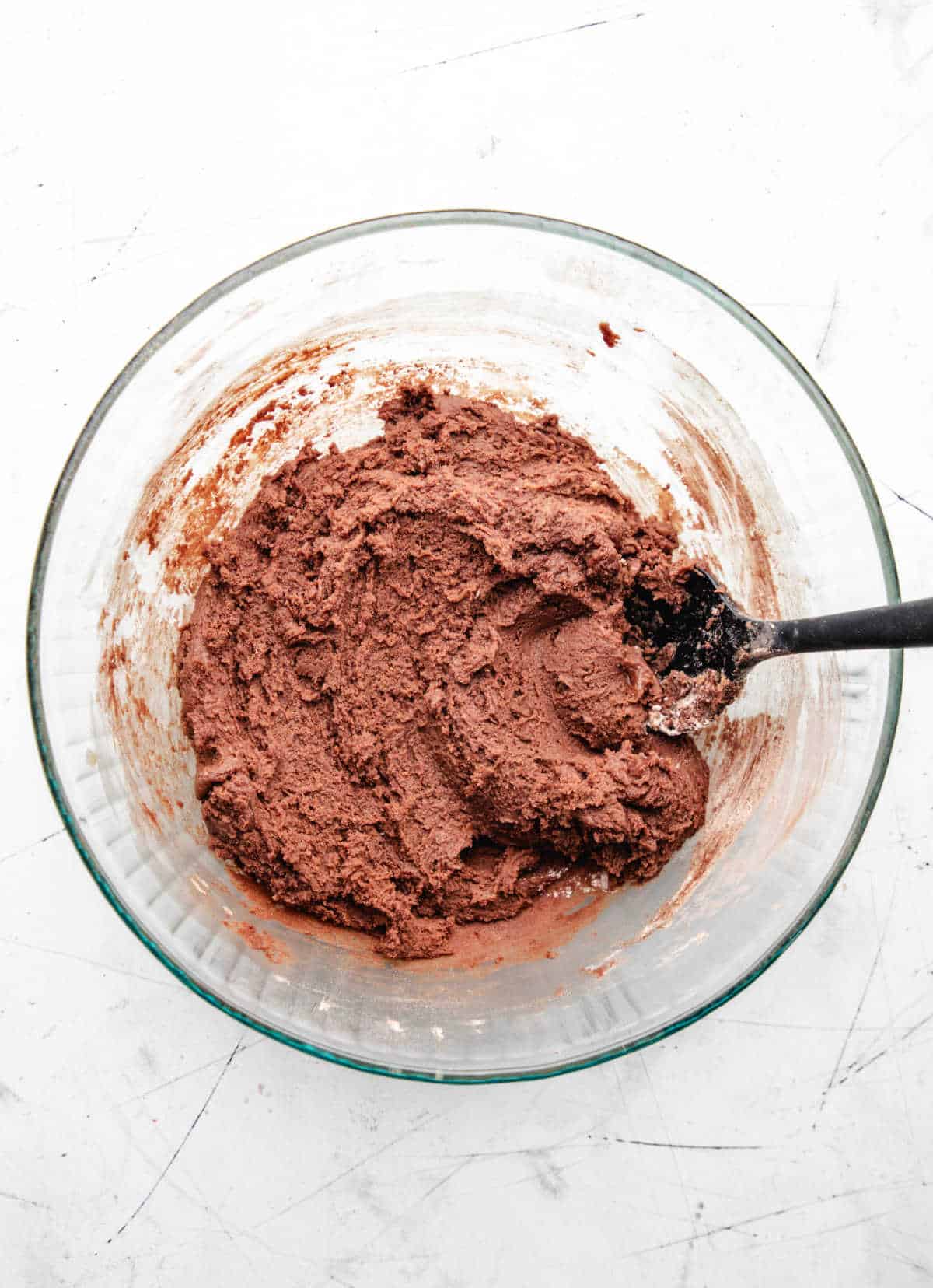 Dry ingredients whisked into wet ingredients for German chocolate cookies.