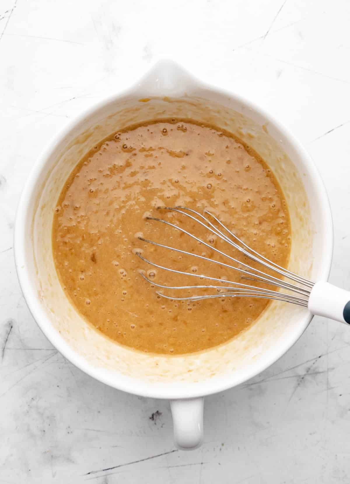 Buttermilk mixed into mashed banana mixture. 