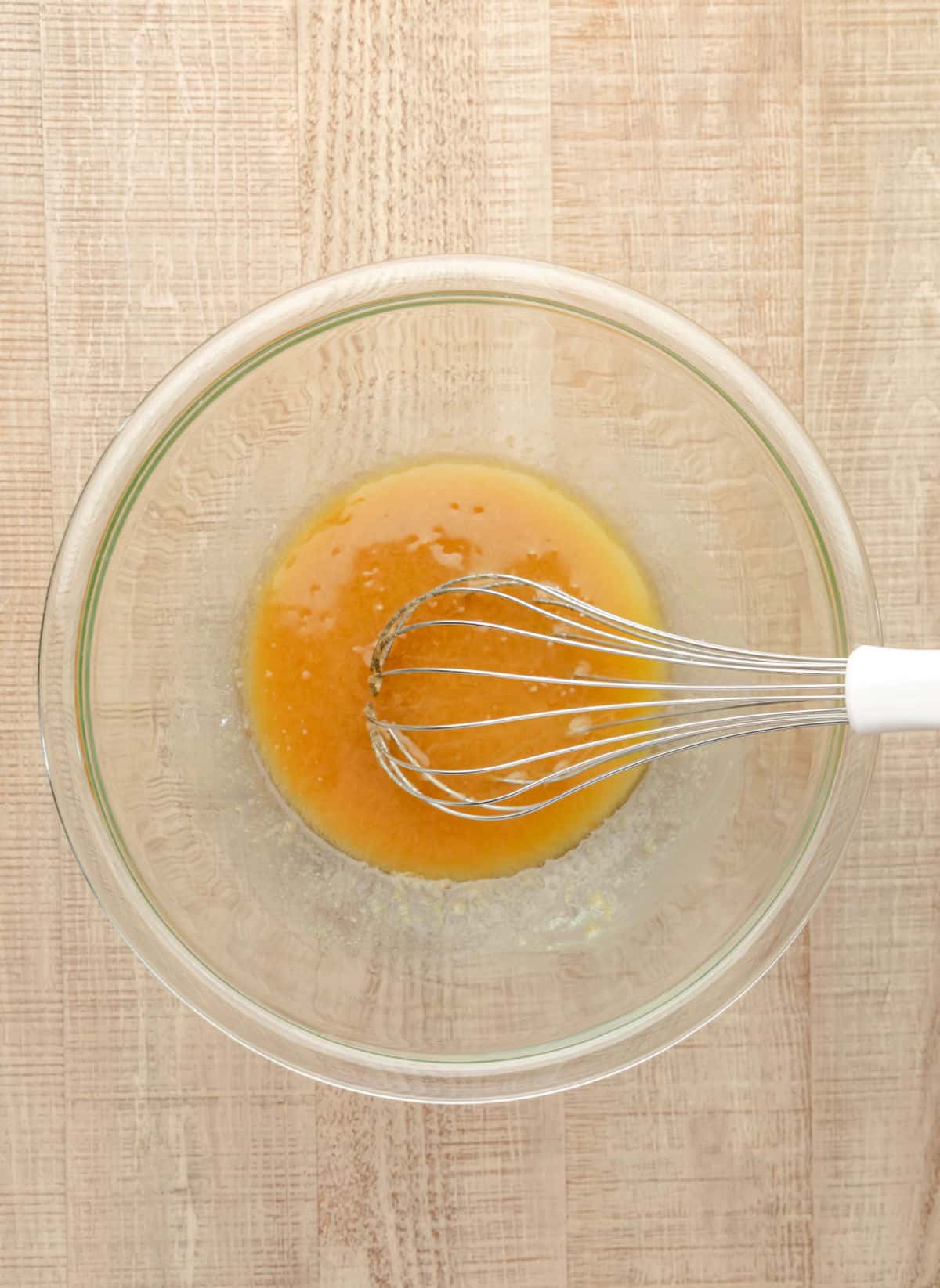Brown sugar and granulated sugar whisked into melted butter. 