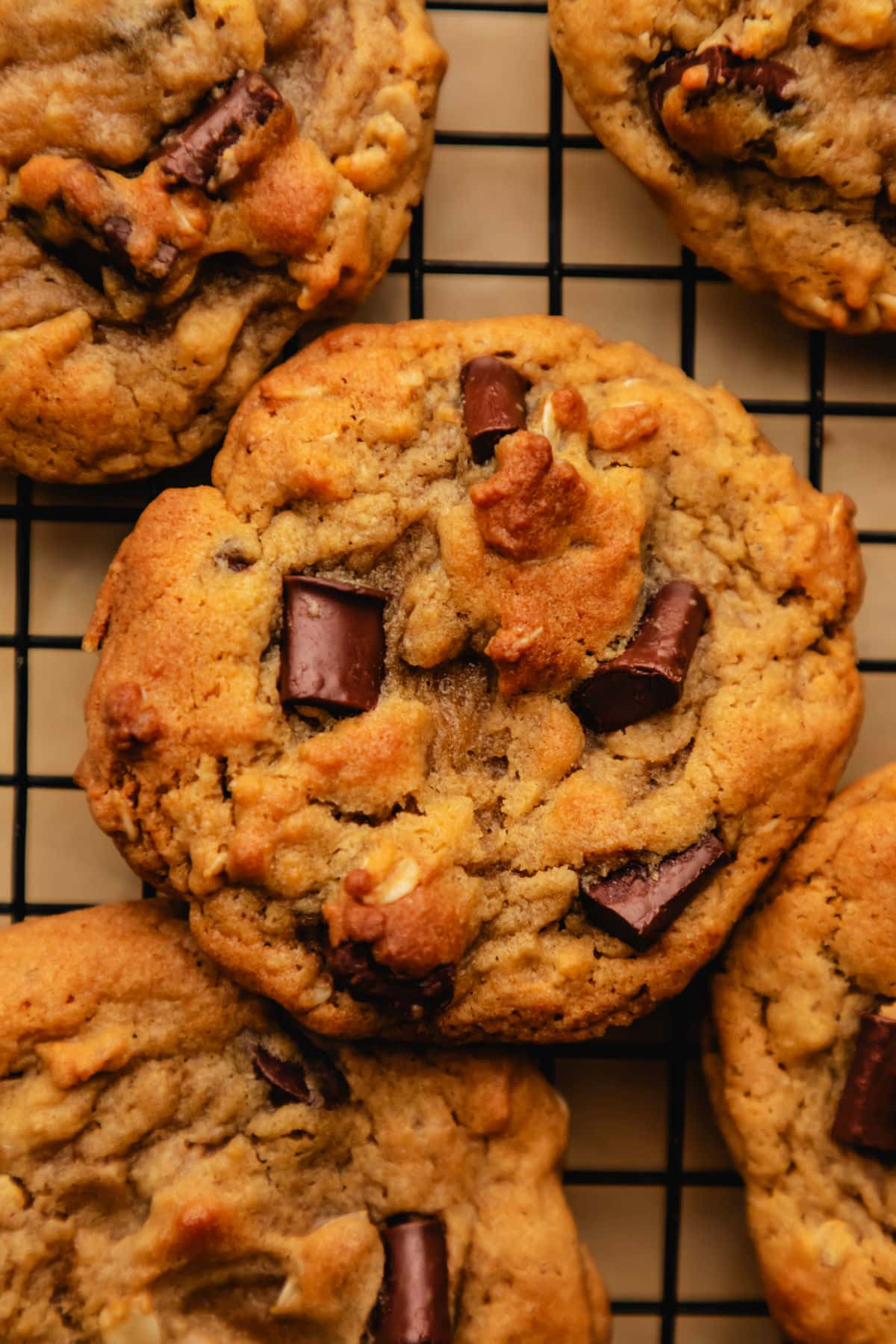 A copycat chick-fil-a cookie overlapping four other cookies. 