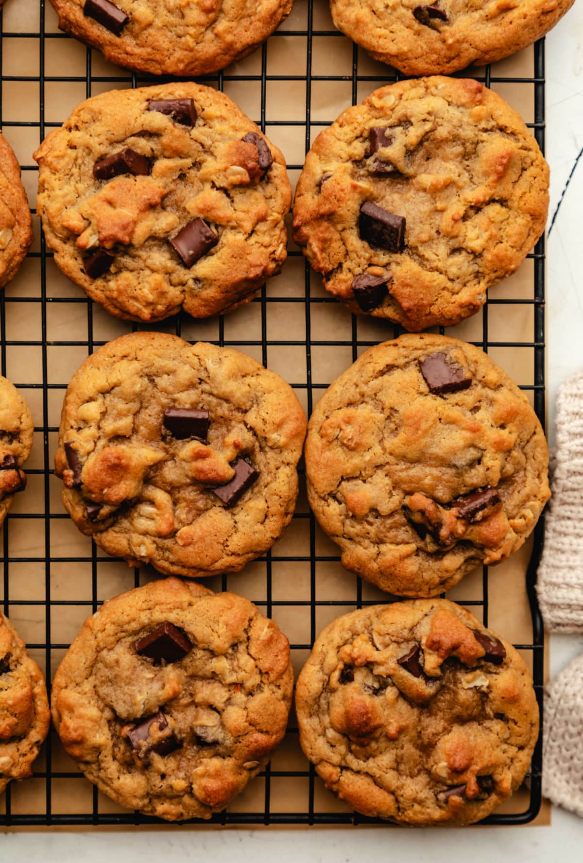 Two rows of chick-fil-a copycat cookies on a wire cooling rack. 