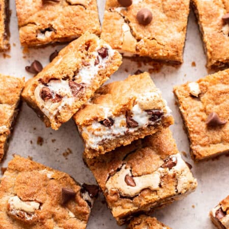 Three s'mores bars stacked sideways on top of each other.