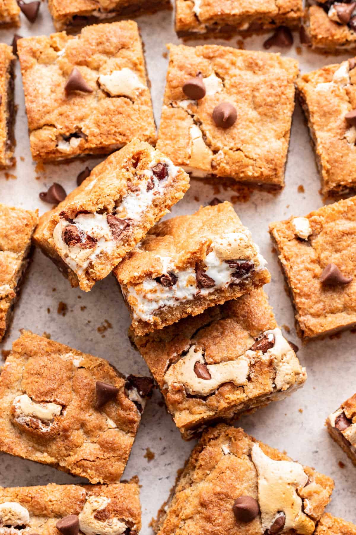 Three s'mores bars stacked sideways on top of each other.