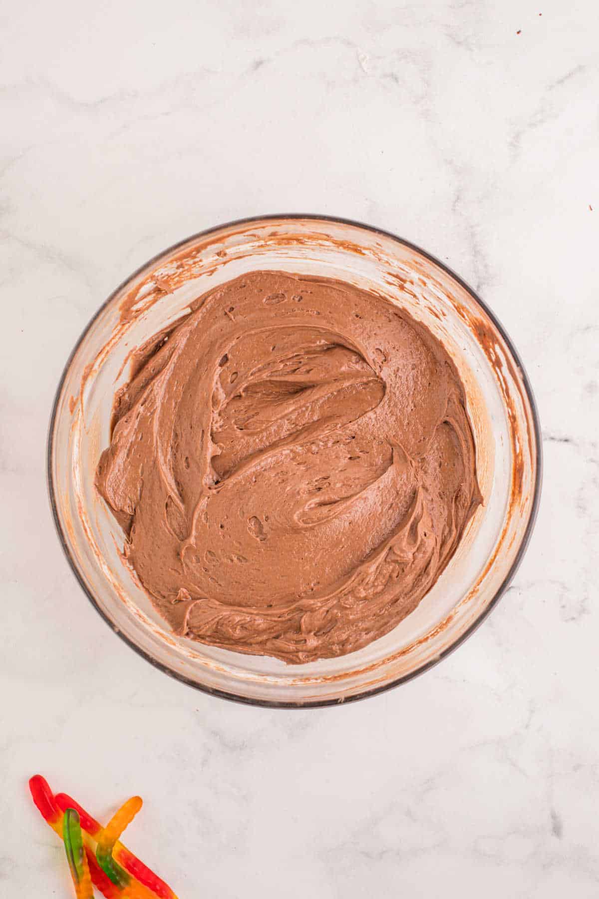 Whipped topping folded into chocolate cream cheese mixture.