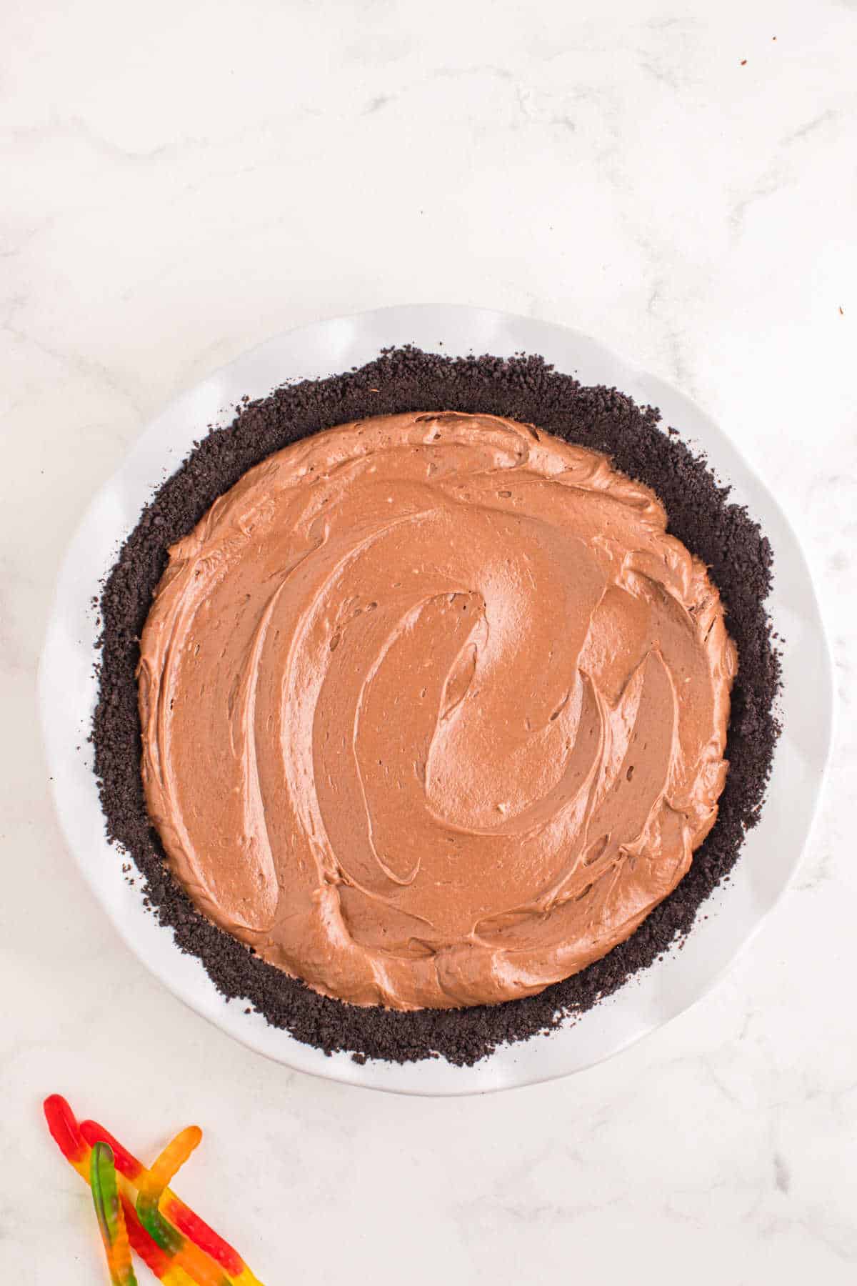 Chocolate filling in a chocolate cookie pie crust.