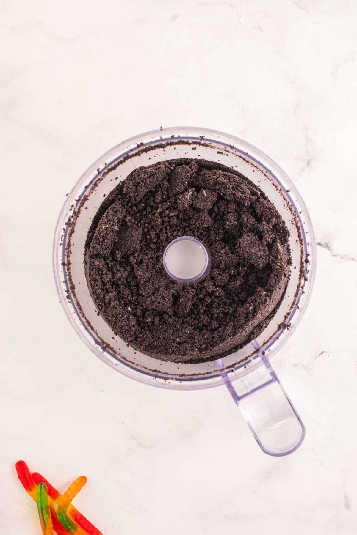 Oreos and butter in a food processor.