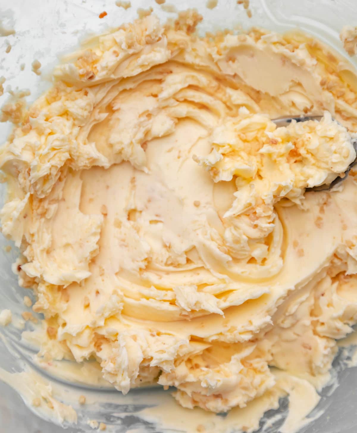 A fork holding homemade garlic butter.